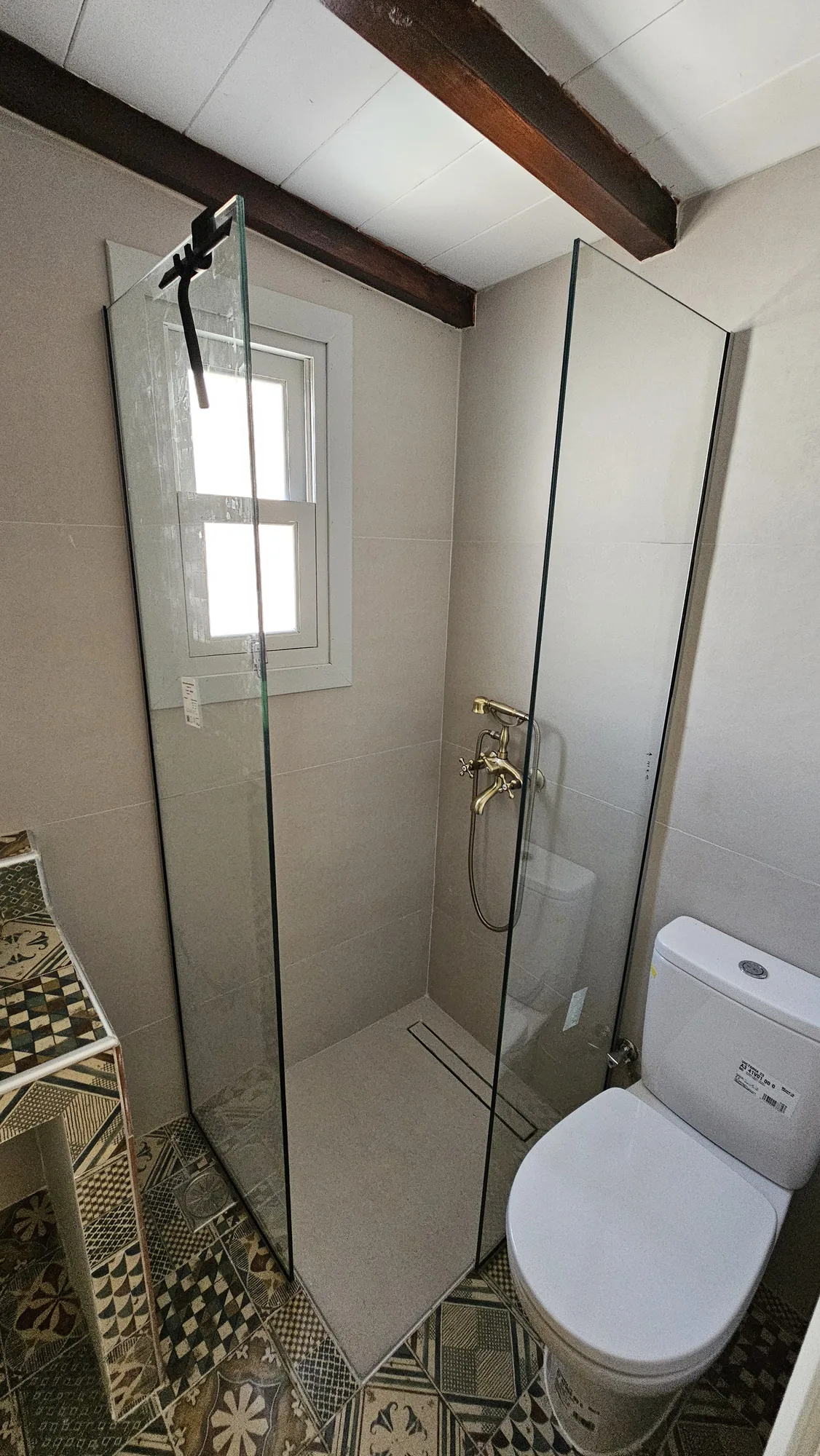 Douche à l’italienne d’angle